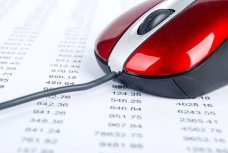 Computer mouse on stock market dataの写真素材