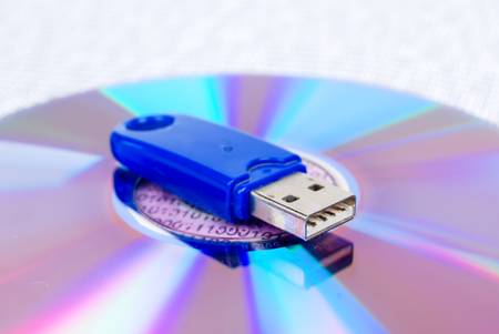 USB disk with DVD on binary codeの写真素材