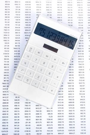 Financial statement with calculatorの写真素材
