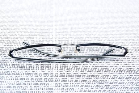 Eyeglasses on binary codeの写真素材