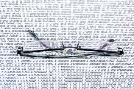 Eyeglasses on binary codeの写真素材