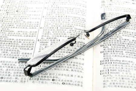 Eyeglasses with bookの写真素材