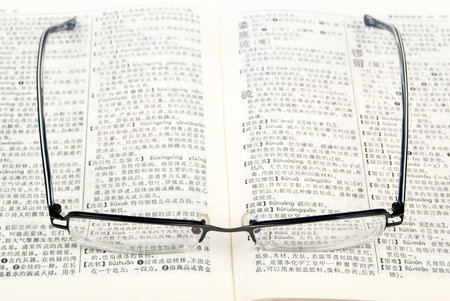 Eyeglasses with bookの写真素材