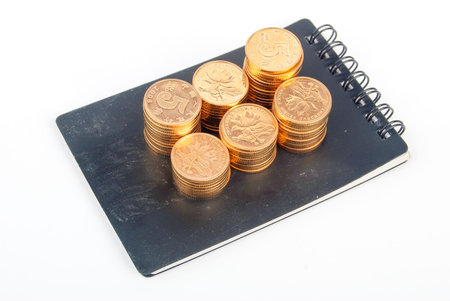 Coin on notebook