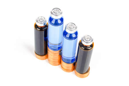 Coin and vialの写真素材