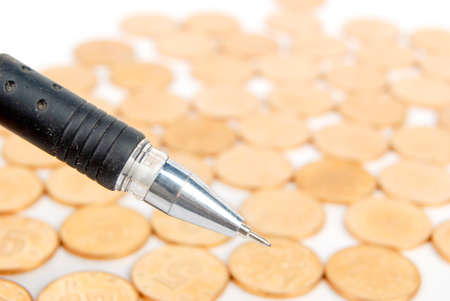 Pen with coinの写真素材