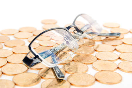 Eyeglasses with coinの写真素材