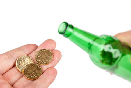 Beer bottle and coinの写真素材