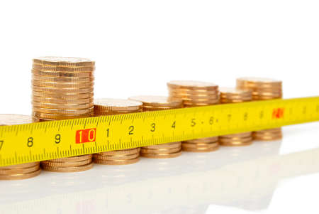 Coin and steel tapeの写真素材