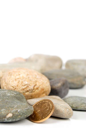 Coin in stoneの写真素材