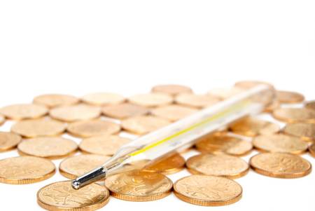 Thermometer and coinの写真素材