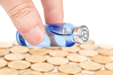 Vial and coinの写真素材