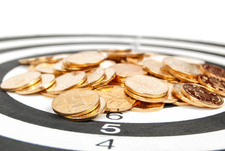 Coin on dartboard