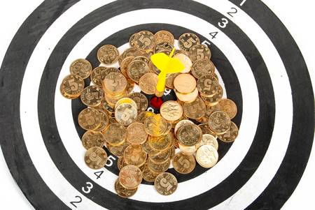 Coin on dartboardの写真素材