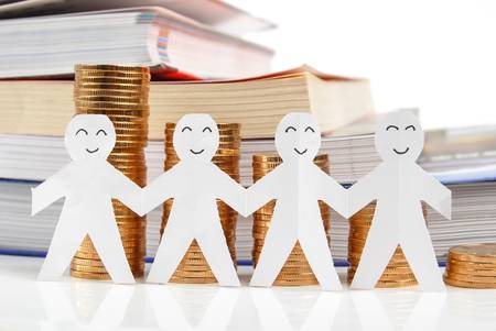 Coin and paper man with bookの写真素材