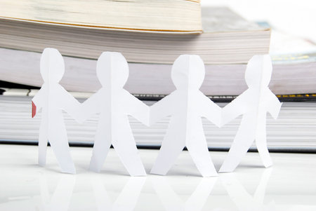 Paper man and bookの写真素材