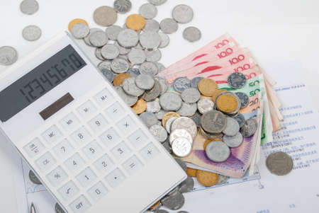 Calculator and coinの写真素材