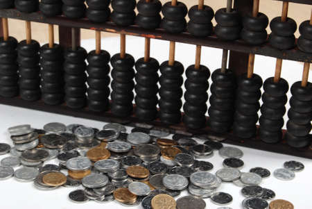 Abacus and coinsの写真素材