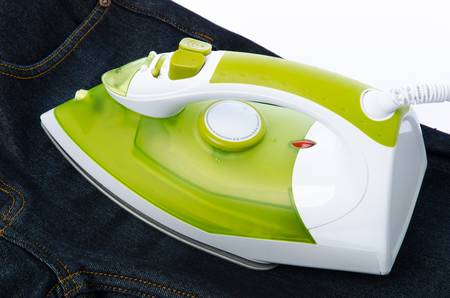 Ironing tool and jeansの写真素材