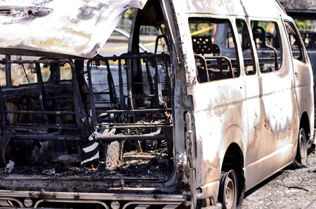 a burn car in a town from thailandの写真素材