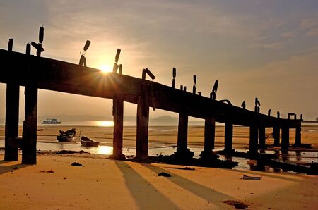 Bridges Concrete on the sea for a boat and peopleの写真素材