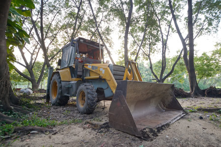 Modern wheel loader backhoe for makes earthworks for the construction.
