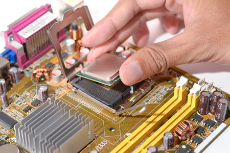 technicial install cpu chip  to mainboard computer