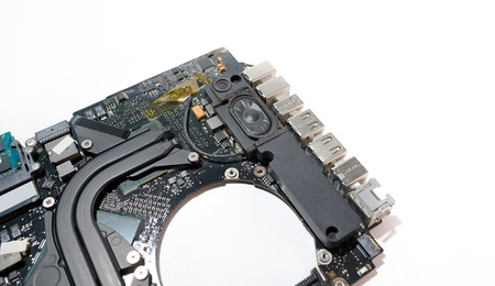 close up inside laptop computer motherboard and speakerの写真素材