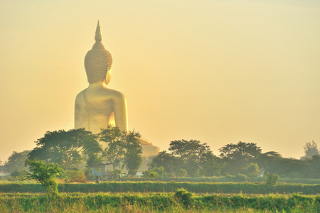 Golden budha Thailand with blue sky at wat muang Thailandの写真素材
