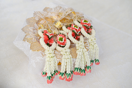 wedding garland on the table for Bride and groomの写真素材