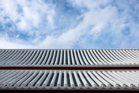 close up old white roof and blue sky