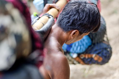 labor Baggage carrier from north of thailandの写真素材