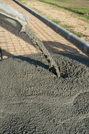 Cement Trucks working in site construction in thailandの写真素材