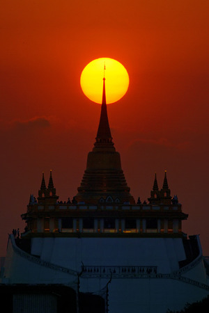 close up golden mountain in bangkok with sunsetの写真素材