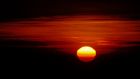 sunset orange sky with tele lenの写真素材