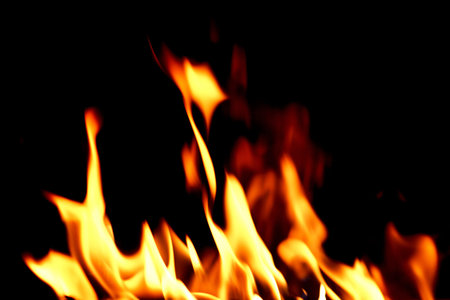 Orange red flame in the firewood pile