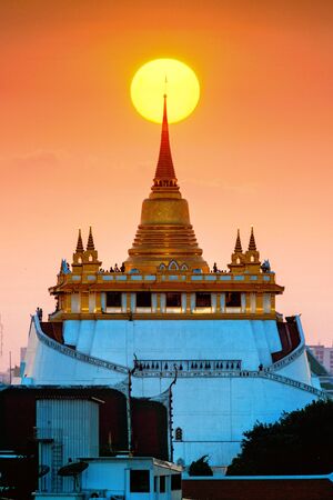 The sun sets at the top of the Golden Mountain  Bangkok.の写真素材