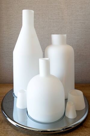 Opaque glass bottle Placed on the tableの写真素材