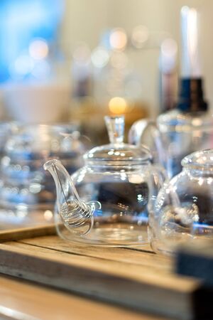 Mug and Kettle coffee set on the tableの写真素材