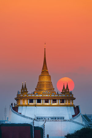 close up golden mountain in bangkok with sunset