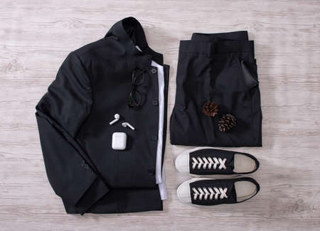 Clothes trousers and shoes on the floorの写真素材