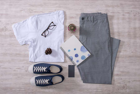 Clothes trousers and shoes on the floorの写真素材
