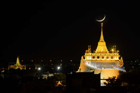 close up golden mountain in bangkok with sunsetの写真素材