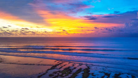 photograph of the morning sea and bright blue gold.の写真素材