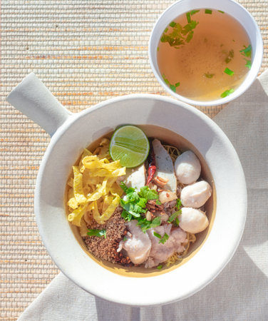 Noodles, Tom Yum, Thai food in a white bowlの写真素材