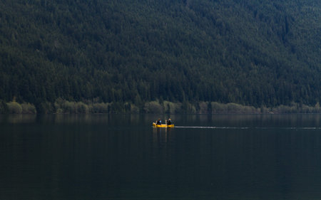 Lake with reflection of mountains with snow