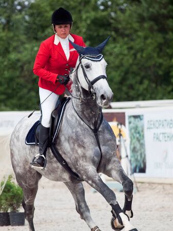 SAINT PETERSBURG-JULY 08: Rider Natalia Simonia on Solana 13 in the CSI3*-W/CSIYH1* International Jumping Grand Prix FEI World Cup Competition 140-160cm on July 08, 2012 in Saint Petersburg, Russia.のeditorial素材