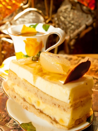 sponge pear cake  with  soft praline in cafeの写真素材