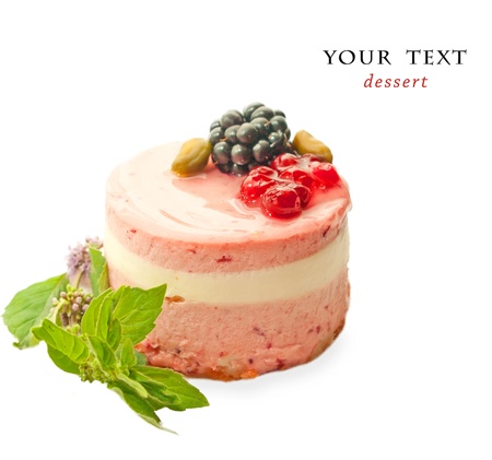 yogurt cranberries cake with mint leaves isolated on whiteの写真素材