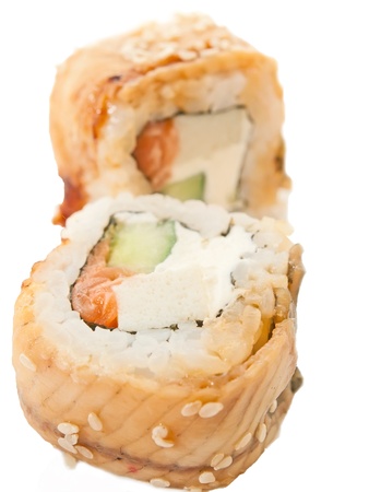 two sushi roll with omelette, salmon and eel  over whiteの写真素材